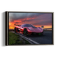 A framed wall art print showing a red sports car on a road at sunset, presented as a 3D gallery wrap canvas against a white background.