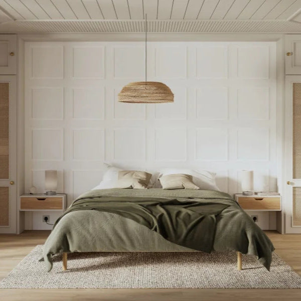 Modern bedroom with a bed, nightstands, and pendant light.
