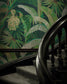 Staircase with decorative green leaf wallpaper