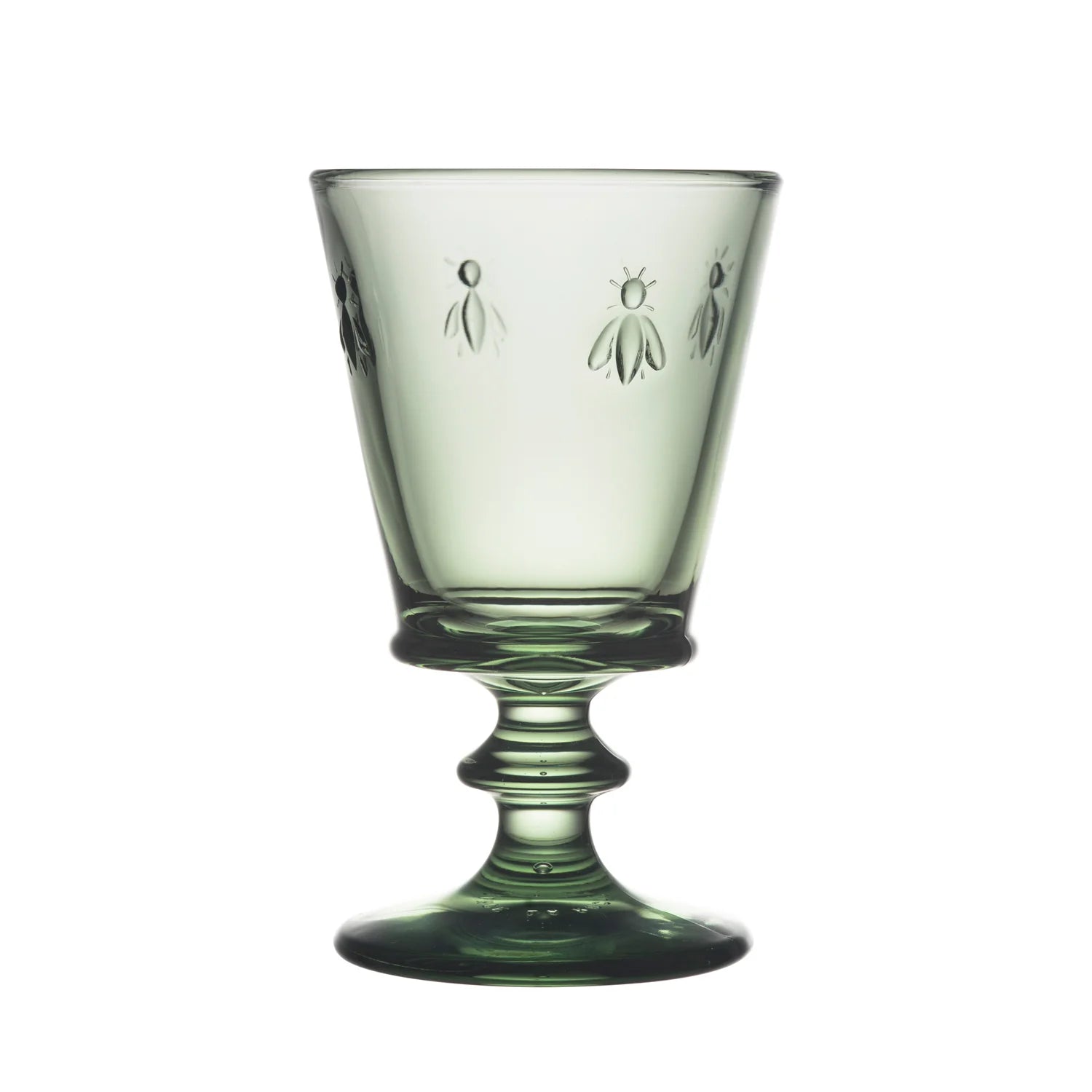 Green glass with bee designs on a white background