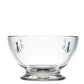 Clear glass bowl with engraved designs on a white background