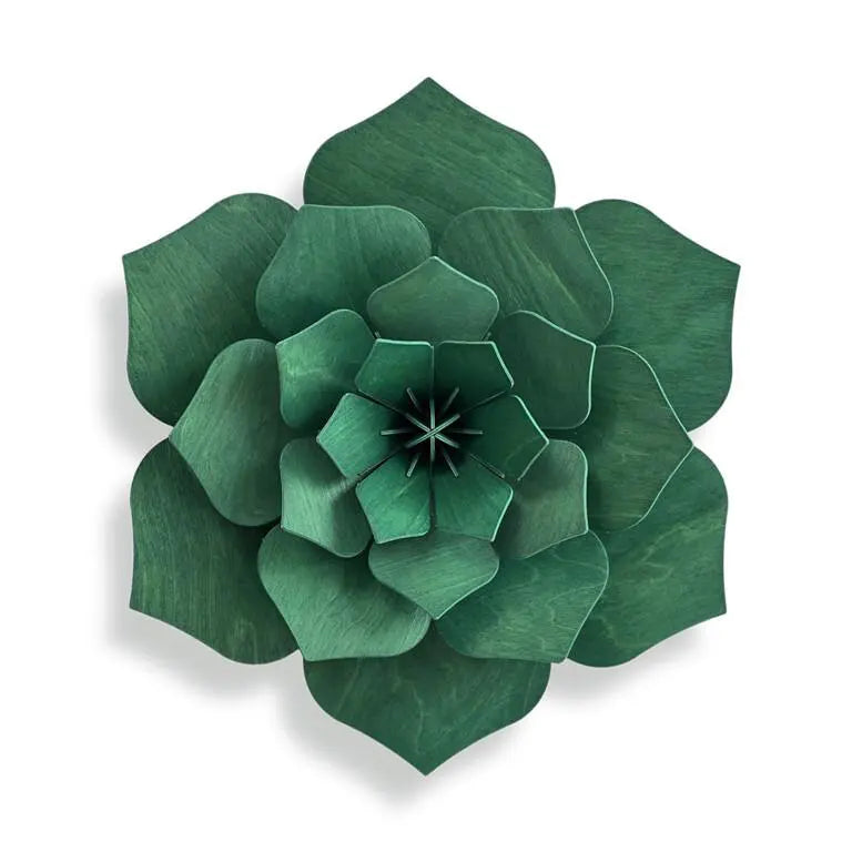 Green wooden flower wall decoration on a white background