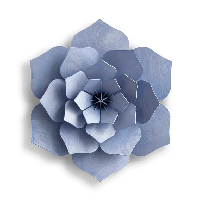 Blue wooden flower wall decoration on a white background