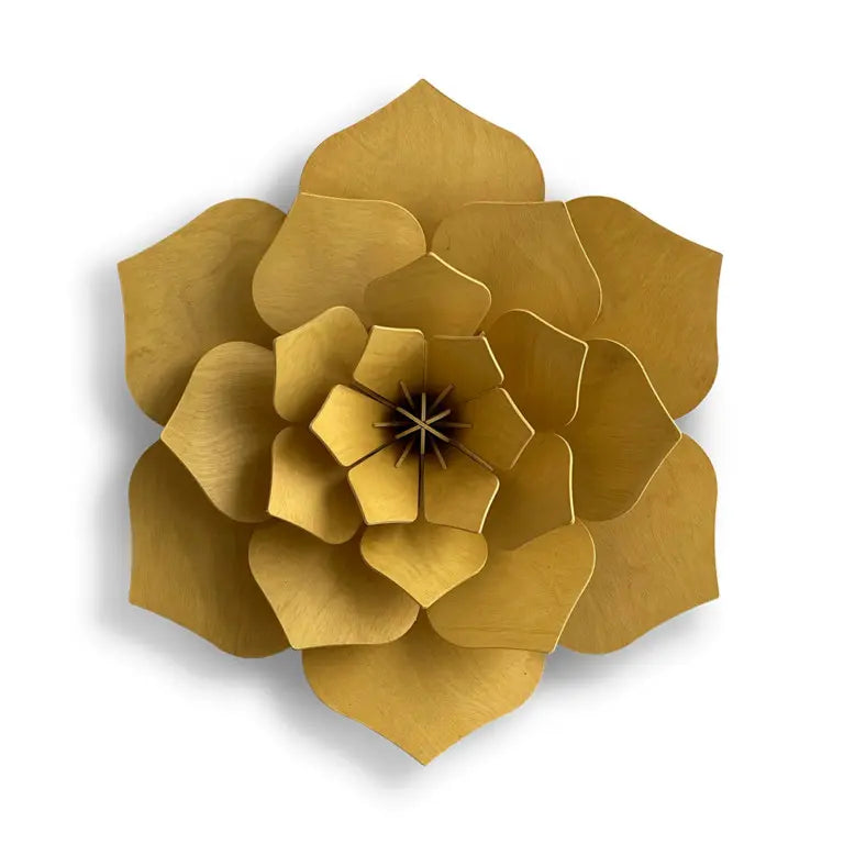 Gold wooden flower wall decoration on a white background