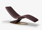 Modern brown lounge chair on a white background