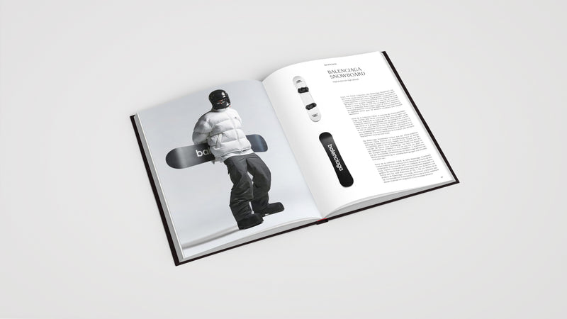 double page of book showing black and white image of a snow boarder and text