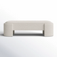 Beige upholstered bench on a white background