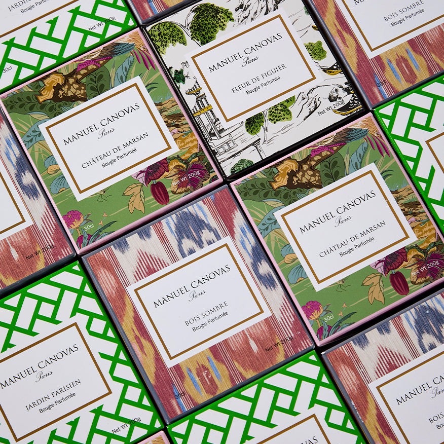 Manuel Canovas perfume boxes on a patterned background