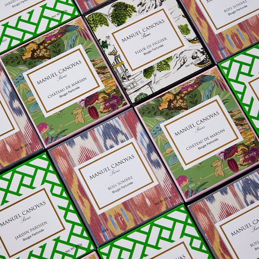 Manuel Canovas perfume boxes on a patterned background