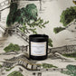 Manuel Canovas candle on a decorative fabric background