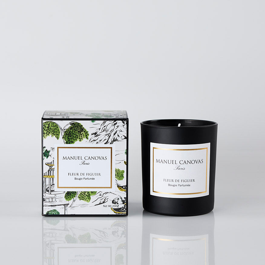 Manuel Canovas candle and packaging on a light gray background