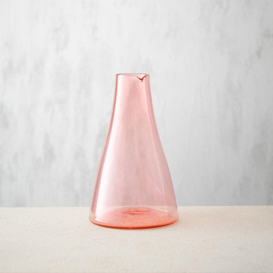 Hand blown glass carafe without a handle in apricot colour