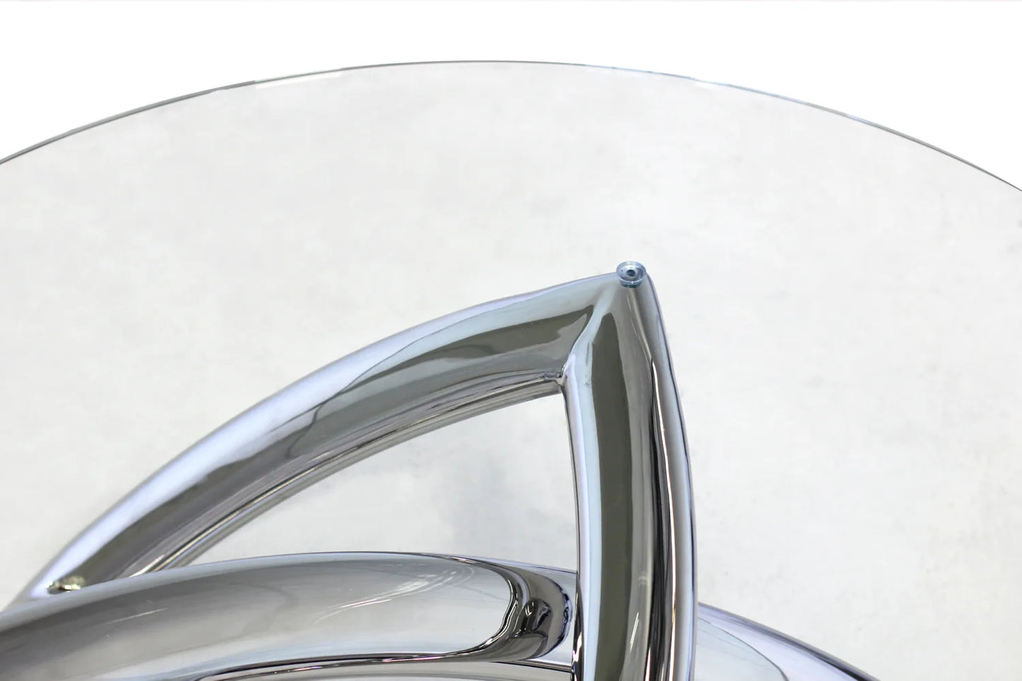 Close up of helix coffee table in stainless steel