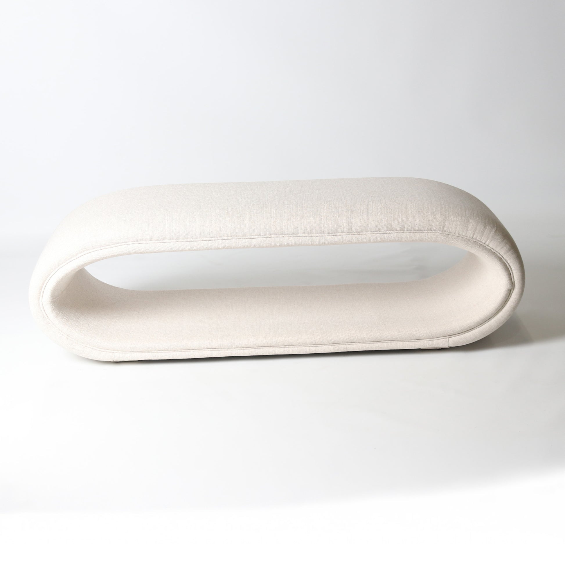 open oval bench in ivory