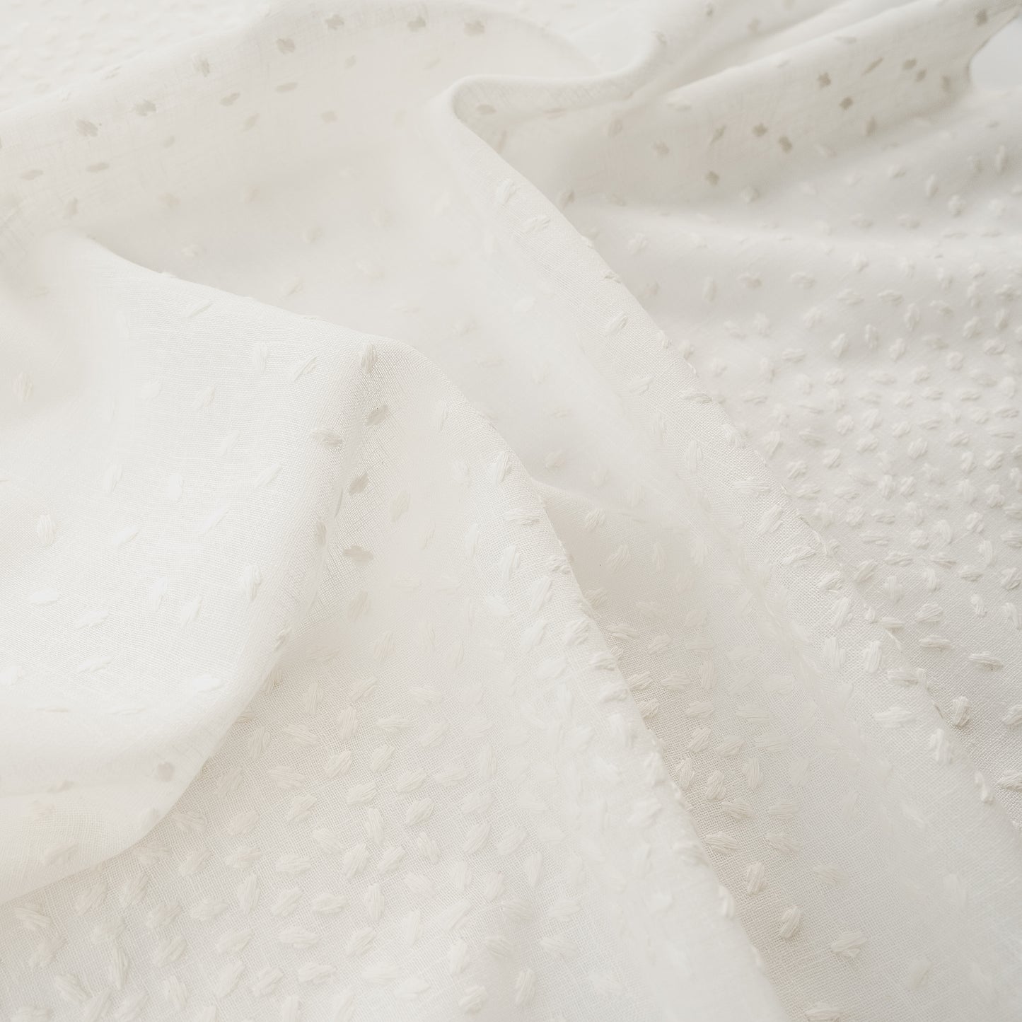 Close-up of textured white fabric