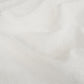 white embroidered drapery fabric wthi leaf pattern