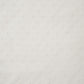 White drapery fabric embroidered with dots