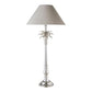 talk nickel lamp with a pineapple and leaves just below the white linen shade