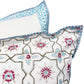 Decorative pillow with floral geometric pattern on a white background