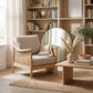 Nautical-themed room with wooden chair, bookshelf, and decorative elements.