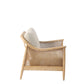 Wicker armchair with a cushion on a white background