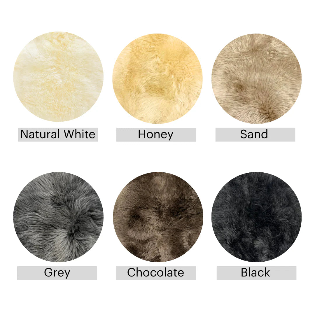Six circular faux fur texture swatches arranged in two rows on a white background, labeled Natural White, Honey, Sand, Grey, Chocolate, and Black.