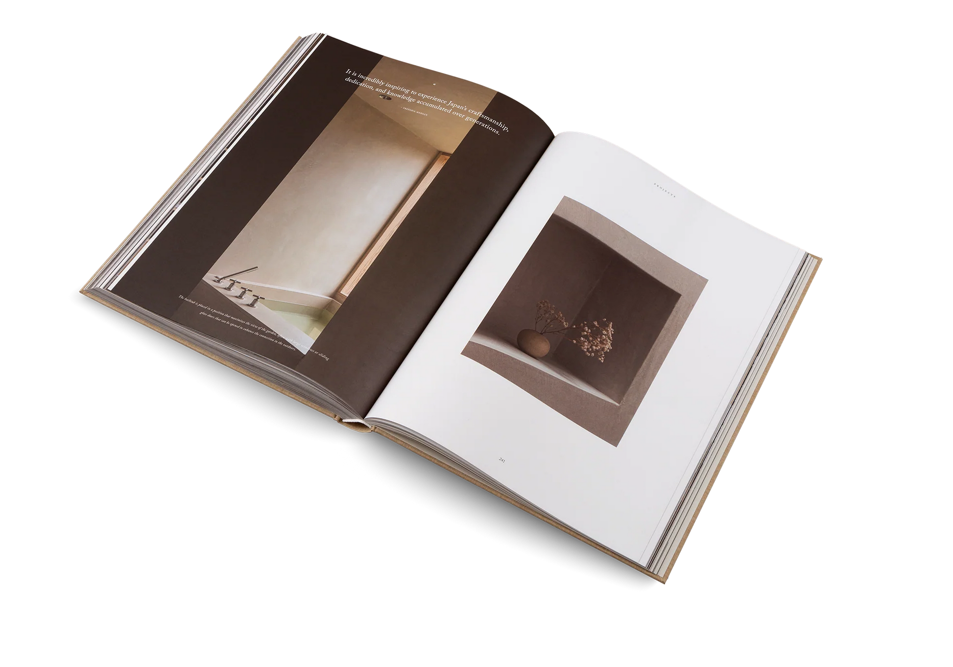 Open book with interior design images on a white background