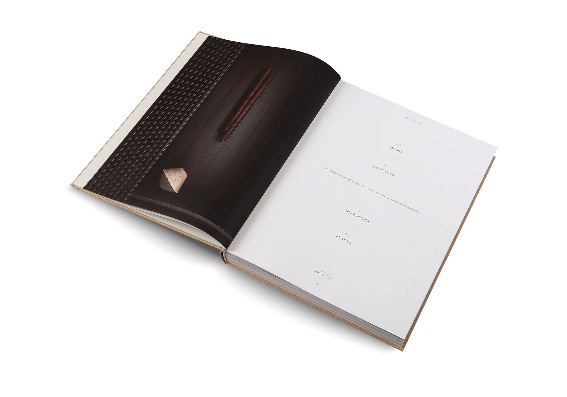 Open book with a dark brown cover and white pages on a white background