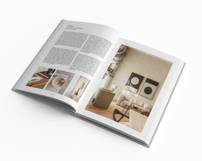 Open book with interior design images and text on a white background