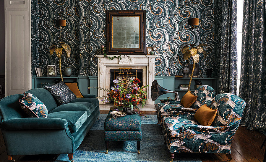 Luxurious living room with patterned wallpaper, teal sofa, and decorative elements.