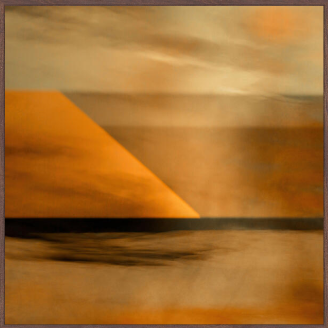 An abstract landscape-style artwork with warm orange and tan tones, featuring a large triangular shape on the left and soft horizontal bands across the composition, framed by a dark border.