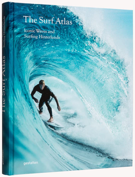 Book cover of 'The Surf Atlas' with a surfer on a wave