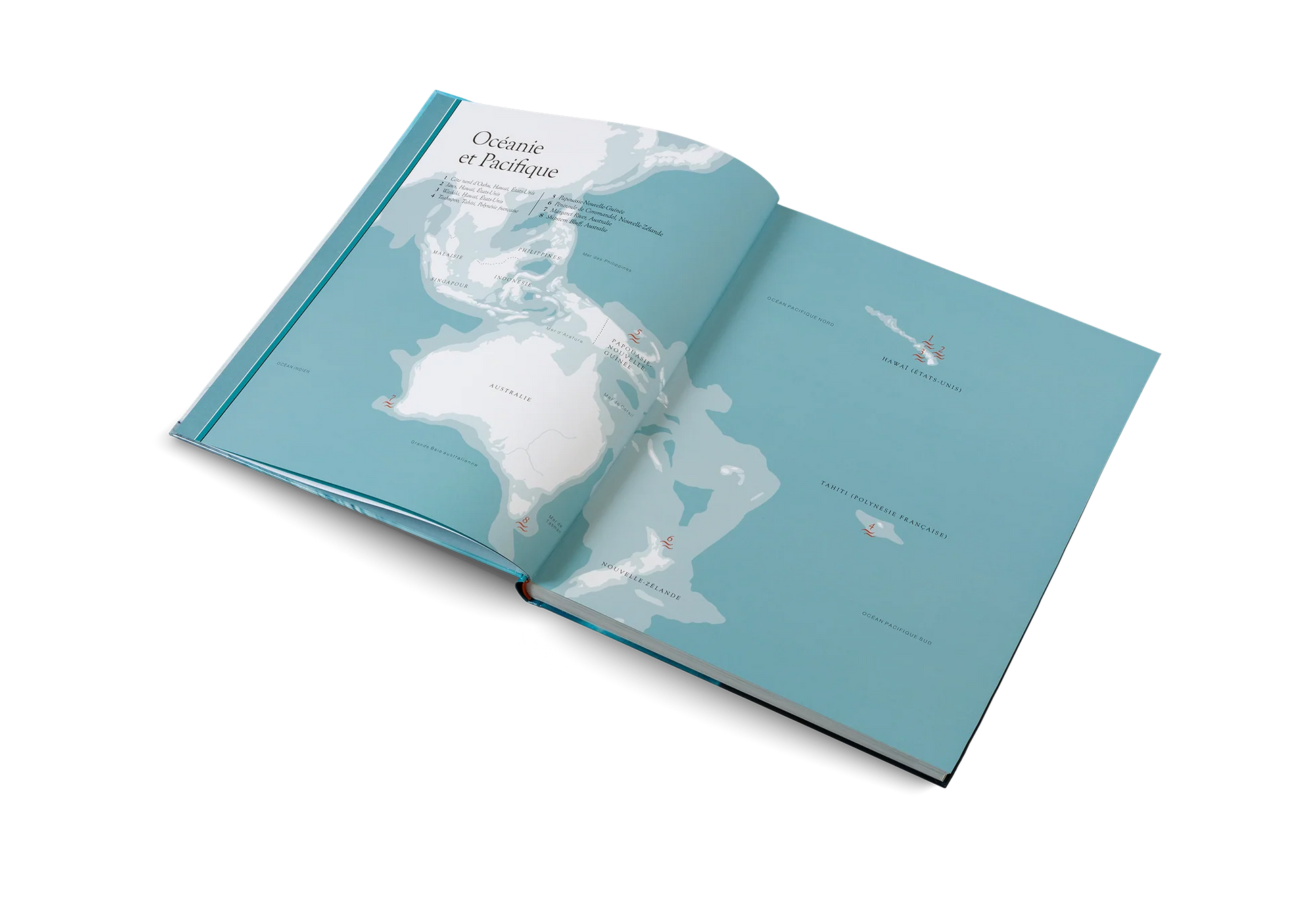 Open book with a map design on a white background