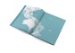 Open book with a map design on a white background
