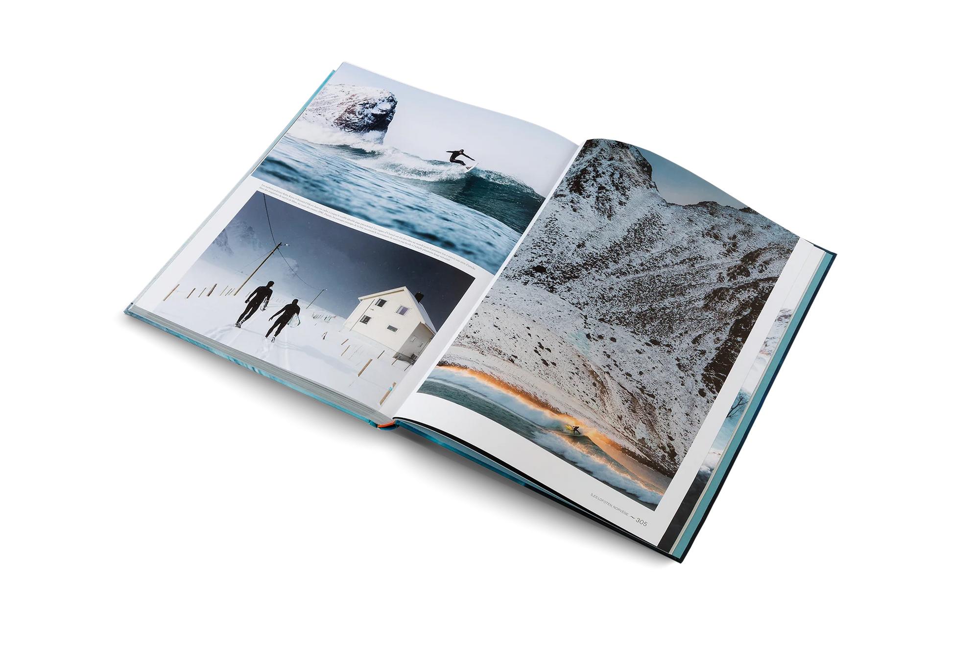 Open book displaying scenic photographs of a snowy landscape with people and a building.