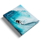 Book titled 'Atlas du surf' with a surfer on a wave cover on a white background