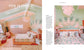 Decorative interior design with pink flamingo theme, featuring a bed and wall art.