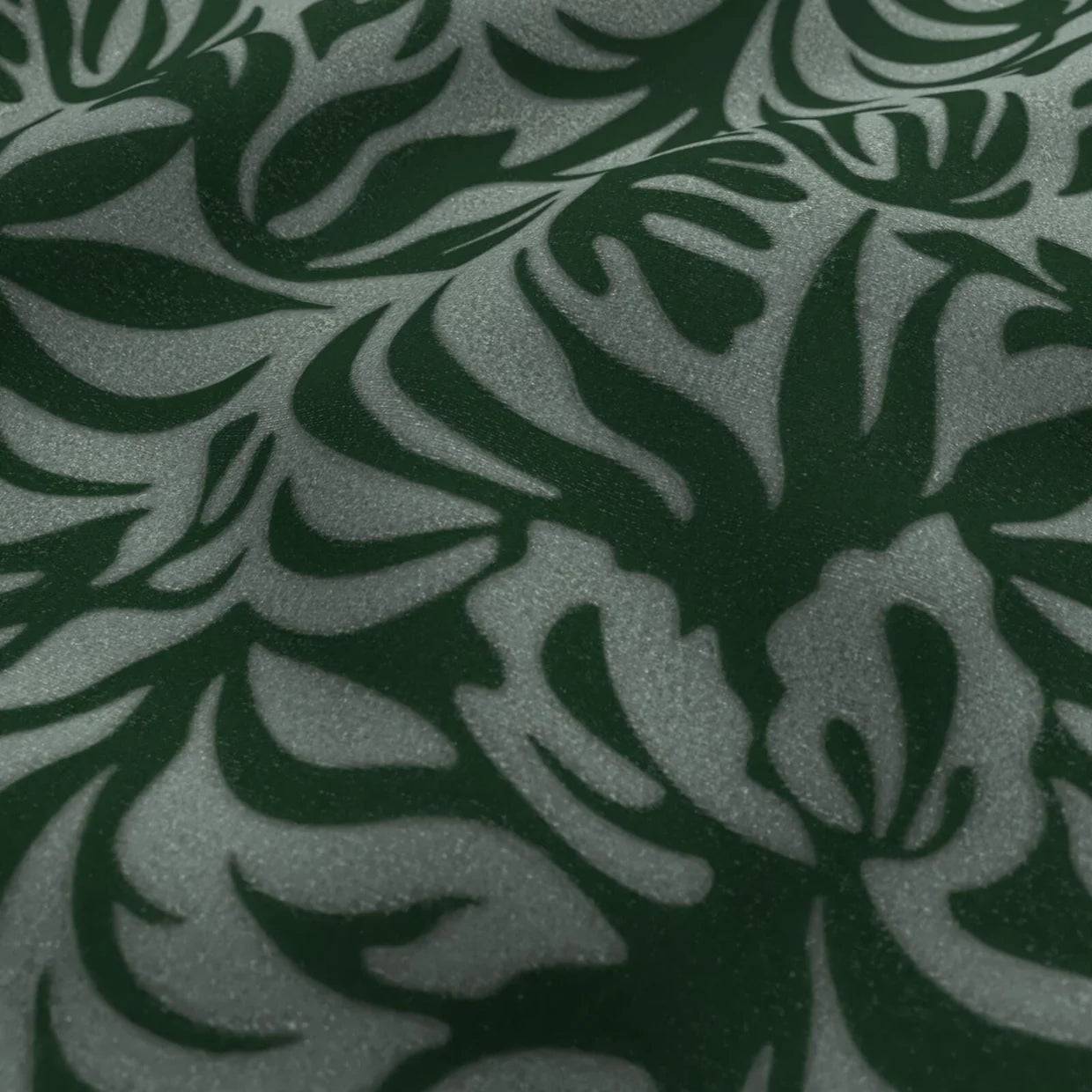 Textured green fabric with leaf pattern