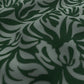 Textured green fabric with leaf pattern