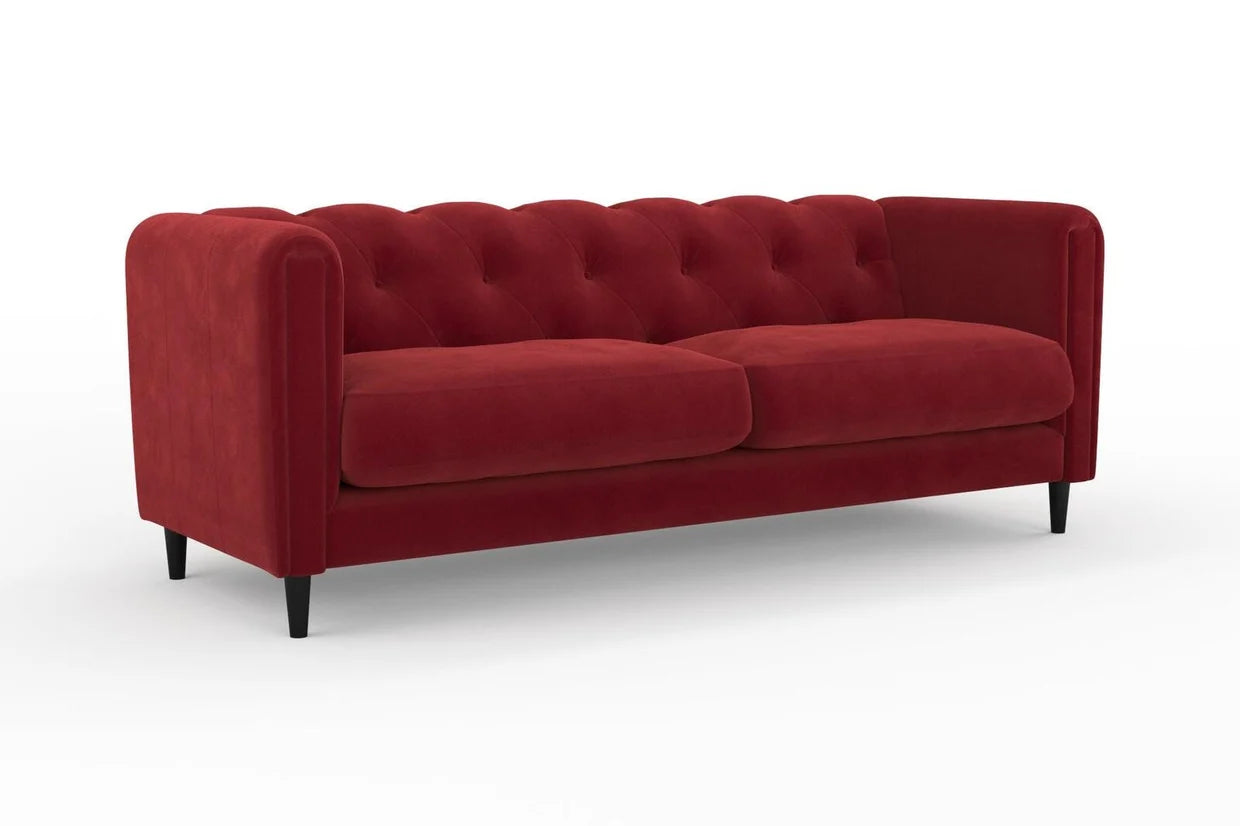 Red sofa on a white background