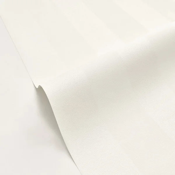 A close-up of a white textured material, possibly wallpaper or a vinyl wrap, shown with a soft fold on a matching white background.