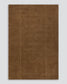 Warm hazelnut colour Bastion wool rug with a hand stitched vertical line