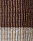 Close-up of a textured woven fabric with vertical stripes in dark brown, medium brown, tan, and off-white, showing the detailed knit or crochet texture.