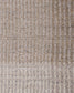 Close-up of a textured knit fabric in a heathered beige and light gray colorway, showing the detailed ribbed stitch pattern.