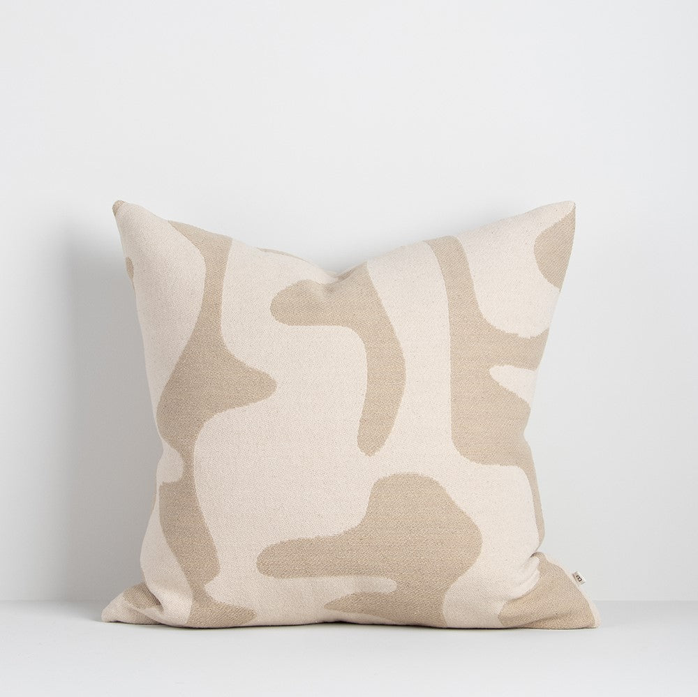 Bennett cushion from Baya in biscuit and ecru colours in abstract tapestry design