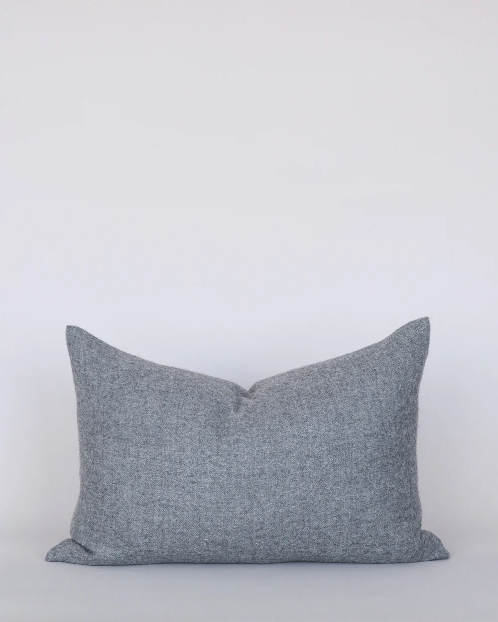 Gray pillow on a white background