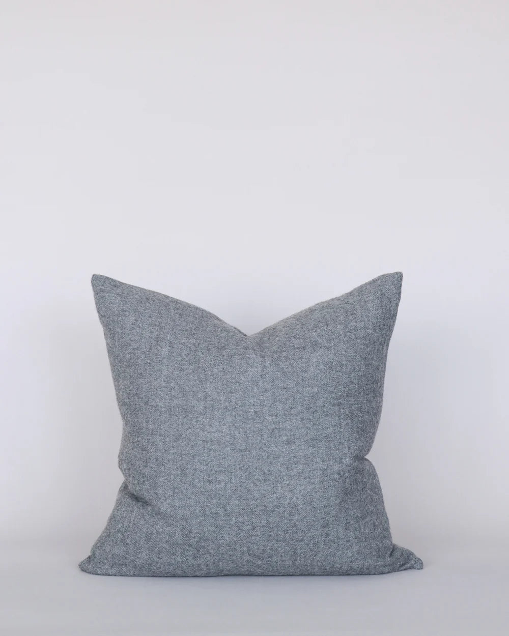 Gray pillow on a white background