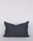 Dark gray pillow on a white background