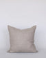 Beige pillow on a white background
