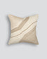 Beige pillow with wavy brown lines on a light gray background
